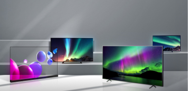 계단에 LG display의 OLED 패널이 사용된 TV 여러 대가 놓여있고, 화면에는 다채로운 색감의 그래픽 이미지가 떠 있다.