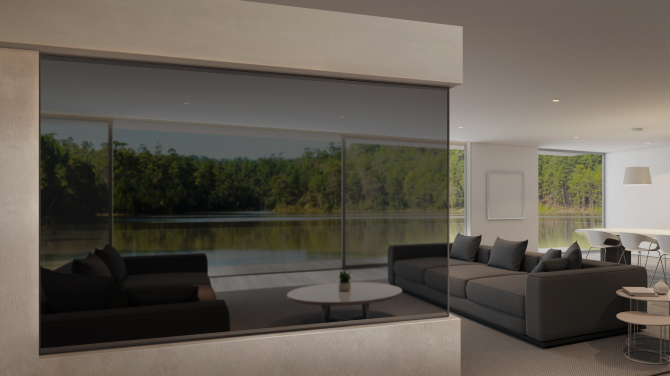 A transparent OLED is mounted on the living room wall, with a faint view of the living room behind the screen.