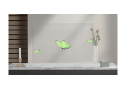Butterfly graphics floating on a transparent glass panel that reveals the indoor background